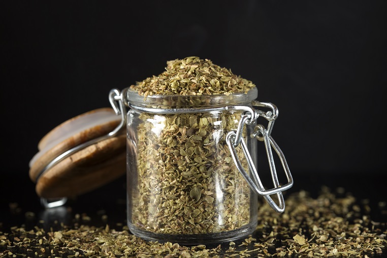 glass-jar-filled-with-dried-oregano-UEZLFYX